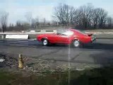 Drag racing . Kyle learns how to race, warming up slicks