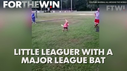 Little leaguer with a major league bat