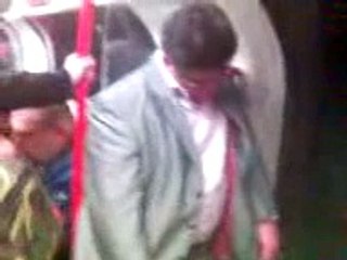 Drunk man in London Tube (MILE END STATION)