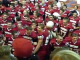 Homecoming game - Football players sing their song after winning the game