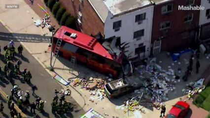8 injured when casino-bound bus crashes into Queens building
