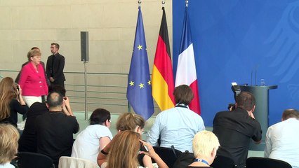 Merkel, Hollande urge unified EU response to refugee crisis