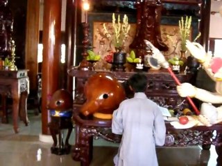 Monk Praying at Temple