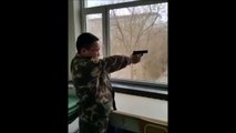 How North Koreans shoot guns.. Or fake it!
