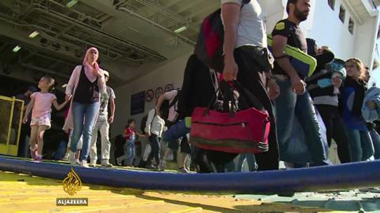 Travelling with refugees on their journey through Greece as arrivals surge