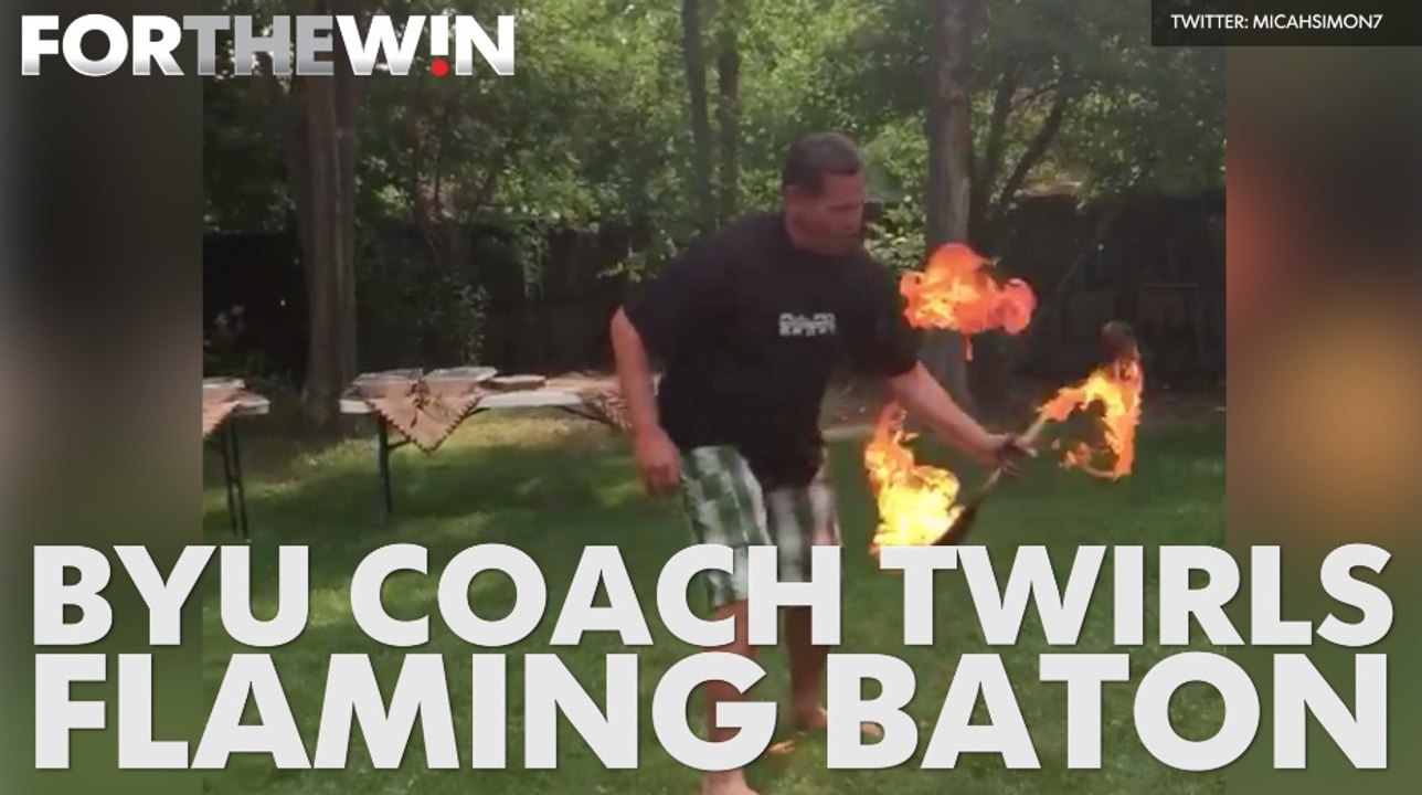 BYU coach twirls flaming baton