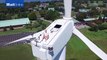Astonishing footage shows man sunbathing on 200ft turbine