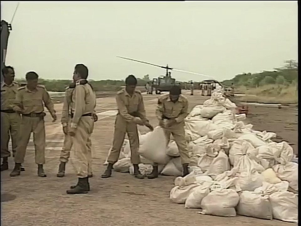 Shabbir Ibne Adil, PTV, News Report: Sindh Flood Relief (Aug, 2003)
