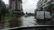Flooded London street amid heavy rain