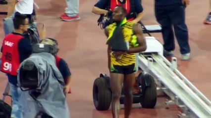 Usain Bolt Knocked Over By Cameraman On Segway After Winning World Championship 200m Gold