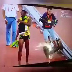 Usain Bolt wiped out by cameraman at World Championships