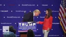 Donald Trump invites woman on stage to prove his hair is real
