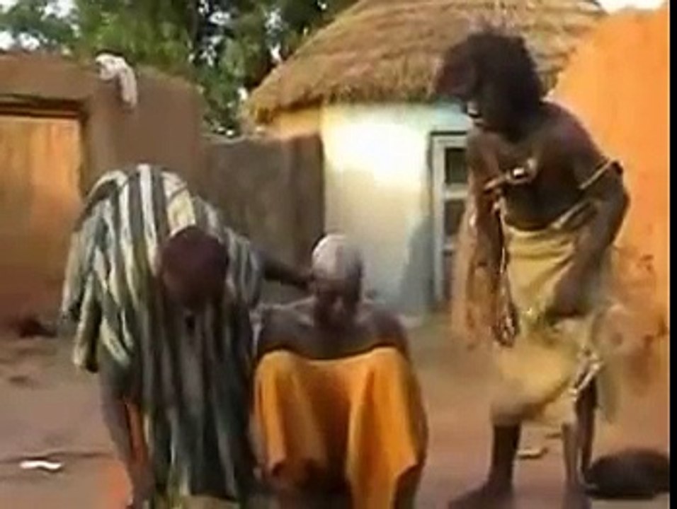 African Voodoo Witchdoctor Treats Man for Migraine