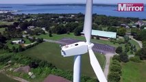 Drone discovers man sunbathing on 60m wind turbine - Geezwild