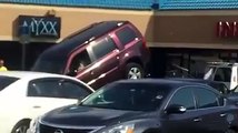 Guy aggressively tries to drive his Truck off a Tow Truck