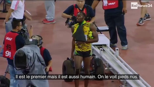 Usain Bolt se fait prendre par derrière par un cameraman
