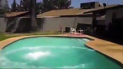 Girl Jumps Off Roof misses pool EPIC Fail
