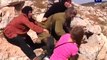 نساء يضربن جندي اسرائيلي في رام الله بعد محاولته اعتقال احد الأطفال