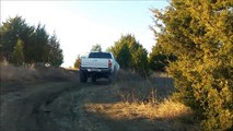 Lifted toyota tacoma offroad on trails