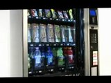 Distributeur automatique boisson froides, boissons chaudes, confiseries et sandwiches.