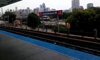 Metra 407 {south} passing through Cermak-Chinatown Station (08/28/2015)