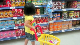 Baby Doing Grocery Shopping -- Artistic Milestones