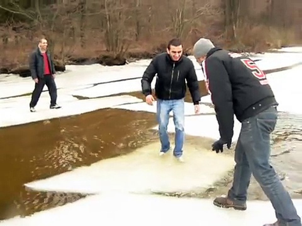 Guys falling in a frozen lake...