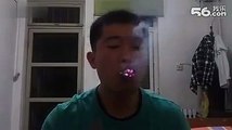 Çinli adamın sigara ile inanılmaz gösterisi! (Komik ve ilginç videolar)