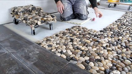 Kieselsteine Mosaik Verlegung