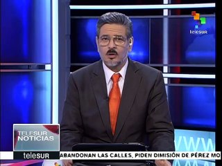 Alemania: activistas pro migrantes abuchean a Thomas de Maizière