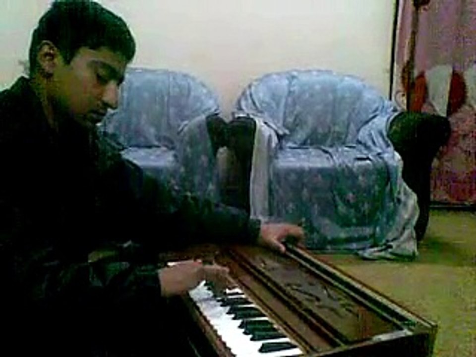 Sarmad ali singer practice harmonium 2014.