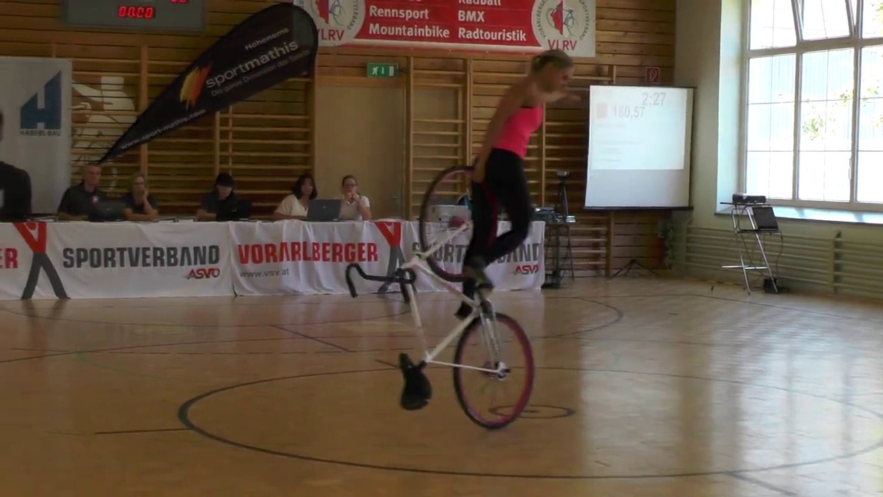 This woman does an impressive acrobat bicycle demo!