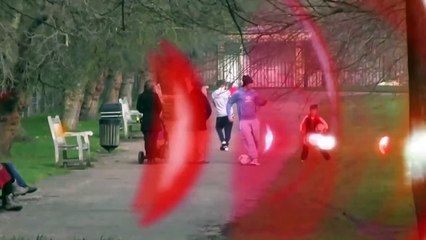 David Beckham and His Boys playing ball out in London Park