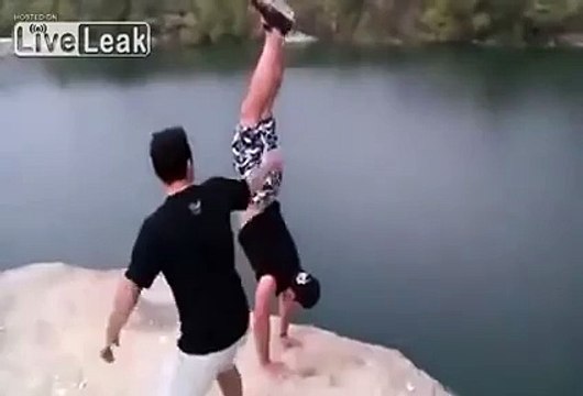 LiveLeak Official - Polish idiot nearly kills his friend by pushing him off a cliff-copypasteads.com