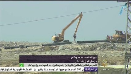 جندي مصري يحاول إطلاق النار على طاقم الجزيرة مباشر أثناء تصوير عمليات إنشاء الأنبوب المائي
