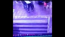 CCTV Footage Sinkhole Swallows Pedestrians Standing at Bus Stop In Harbin Sinkhole in China
