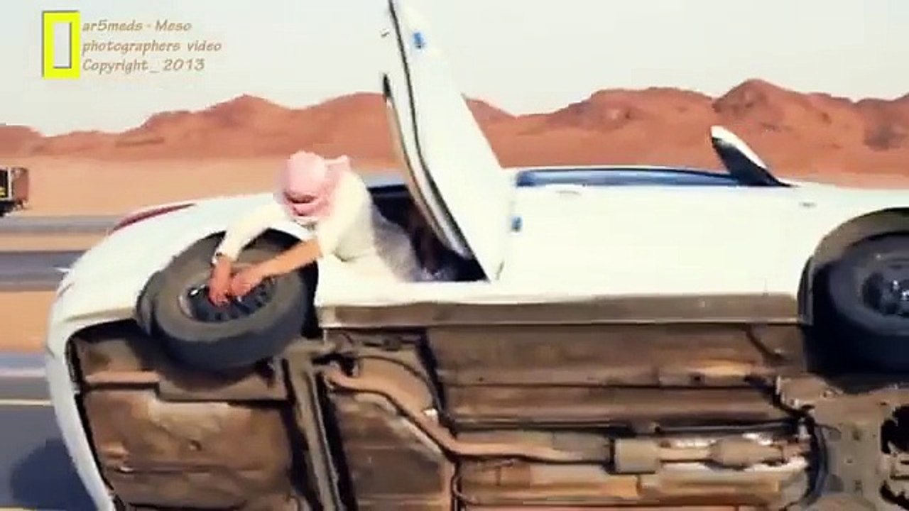 Arab change car tyres while driving