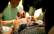 Young mother's Natural birth at hospital