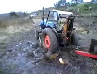 Tractor Stuck Deeply in Mud