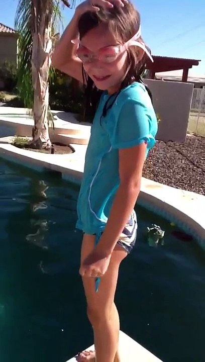 Crazy girl jumping in pool