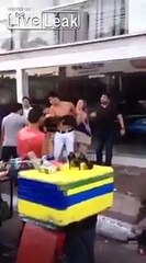 Girl triangle chokes boyfriend to stop fight outside of club in Brazil.