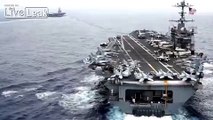 Naval Dominance: Two U.S. Aircraft Carriers Sail Side By Side.