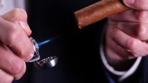 How to Light a Cigar with a Torch Lighter #Cigar101 - Famous Smoke Shop