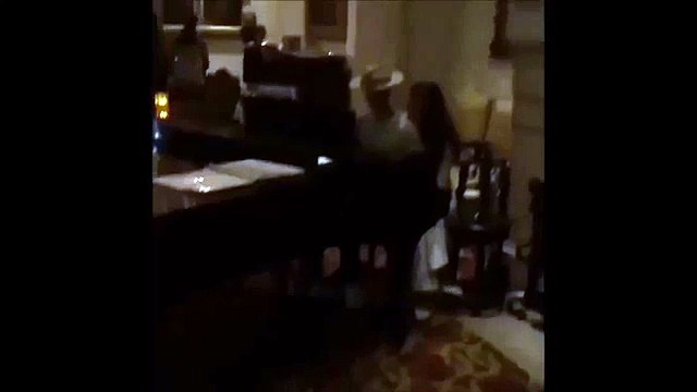 Justin Bieber playing the piano with Xenia Deli in Los Angeles, California August 21, 2015