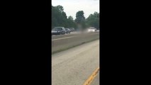 Naked man running down Cincinnati Highway