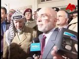 King Hussein speaks to reporters alongside Yasser Arafat October 1997