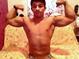 preview : 18 y/o wrestler Iono shows chest , flexes biceps