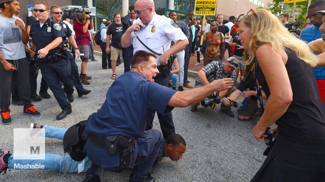 Freddie Gray trial begins with protester arrest in Baltimore