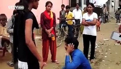 Indian girl tracks down her molester and beats him in public