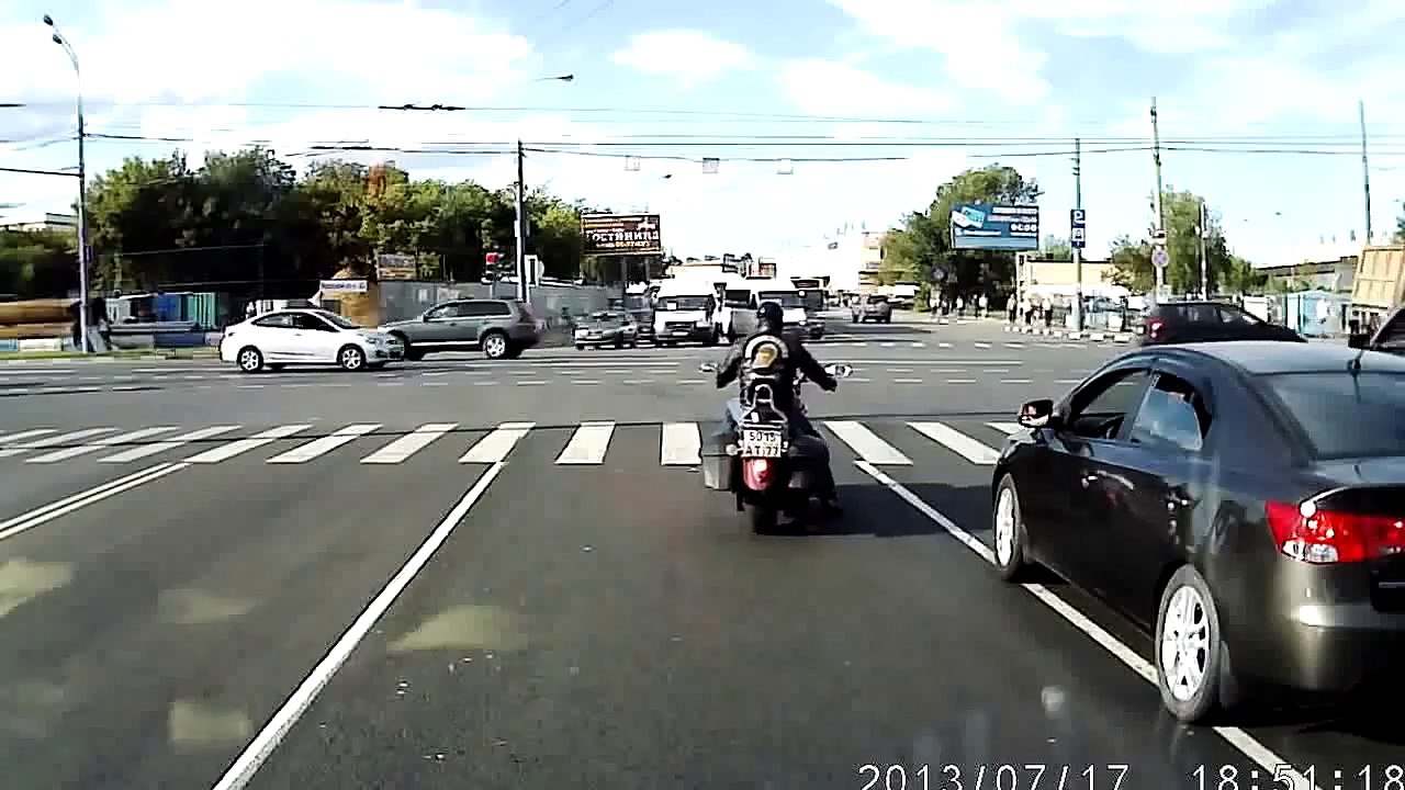 Motorcycle rider crashes hard into car taping him Original HD